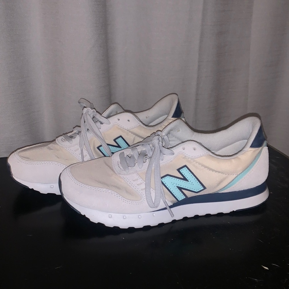 New Balance 311 grey and blue sneakers